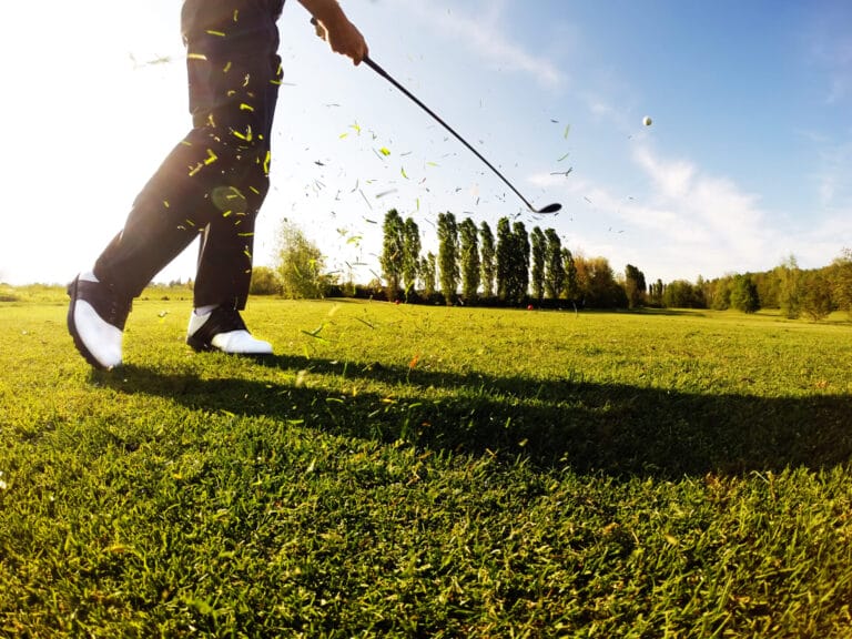 Golfer Performs A Golf Shot From The Fairway 2021 08 26 17 24 33 Utc